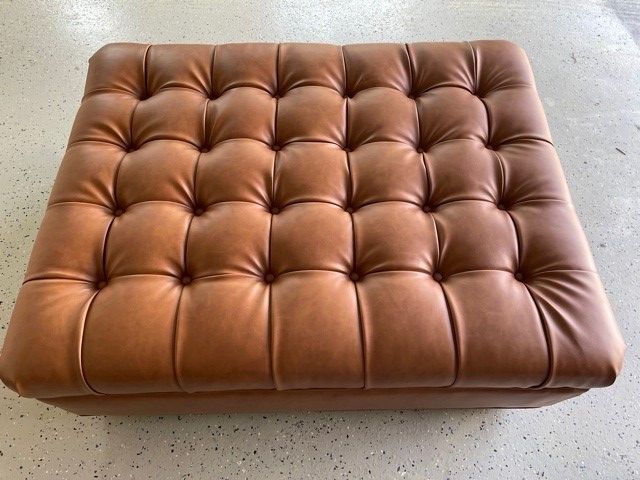 Tufted sofa after completion